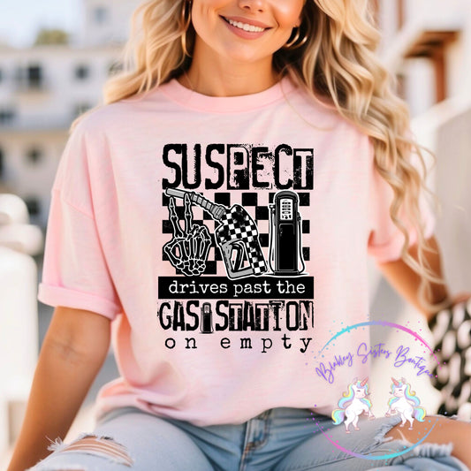 Suspect Drives Past The Gas Station On Empty